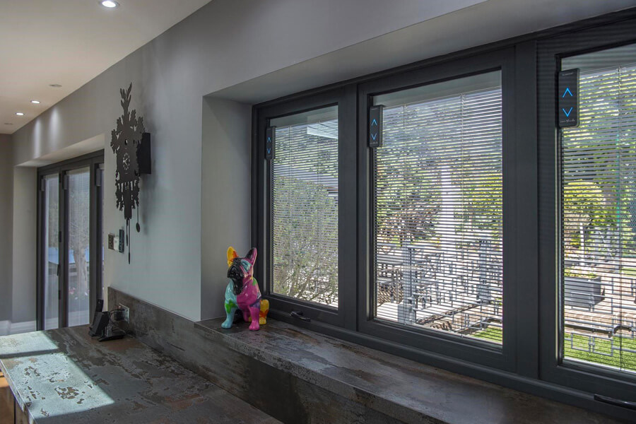 white integral blinds on black windows